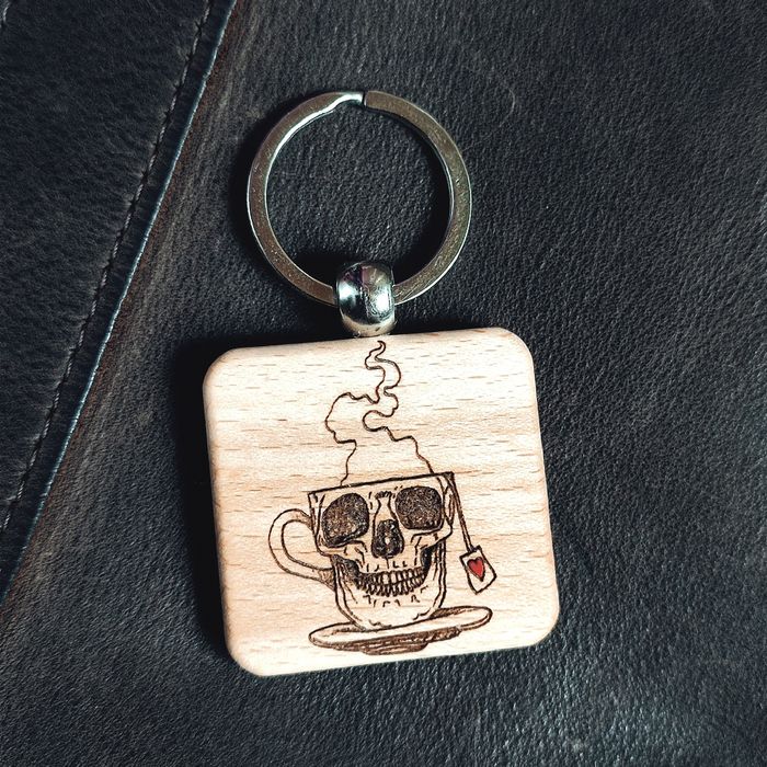 брелок religion бук