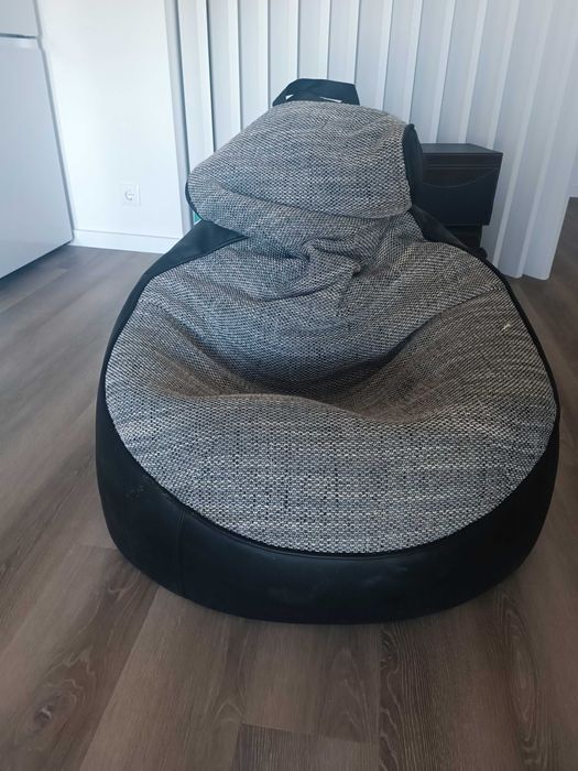 Large puff made of synthetic leather and fabric