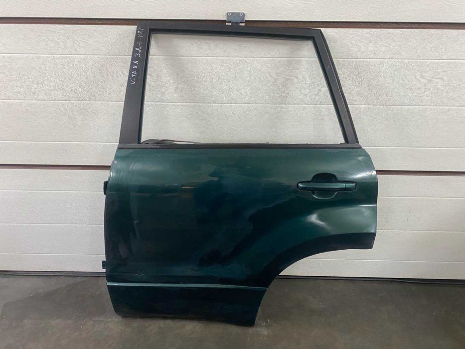 Двері дверка дверь задні ліві Suzuki Grand Vitara 05-14p.