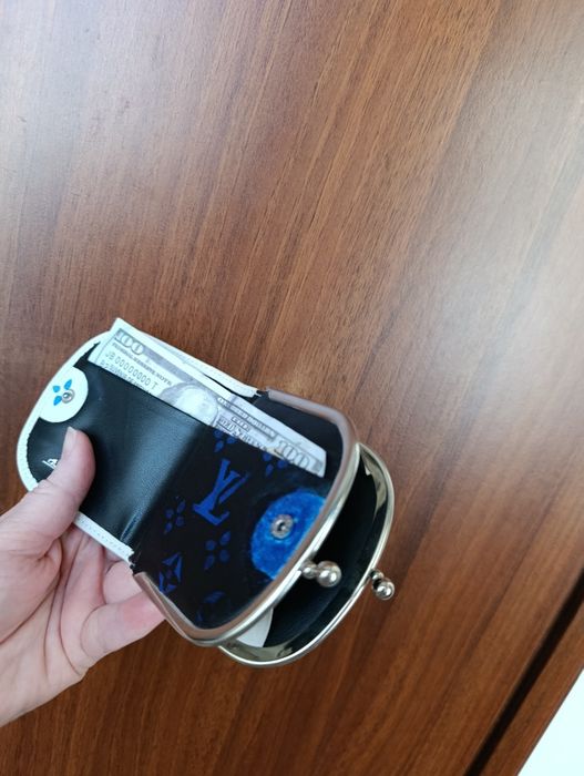 Гаманець . Гаманець