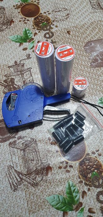 Itiqutadora com rolos e etiquetas