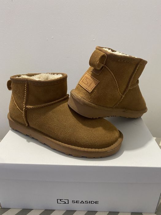 Bota castanha de pelo