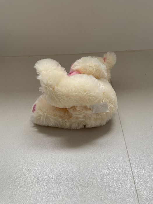Elefante pequeno em peluche e ursinho