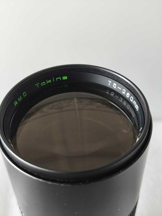 lente Tokina RMC 70–260mm f/4.5 FD lente zoom + bolsa + filtro Vivitar