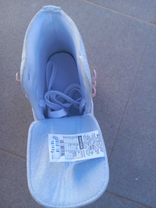 Patins 36 + capacete + protecoes xs + saco