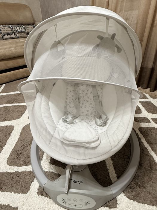 Заколисуючий центр гойдалка