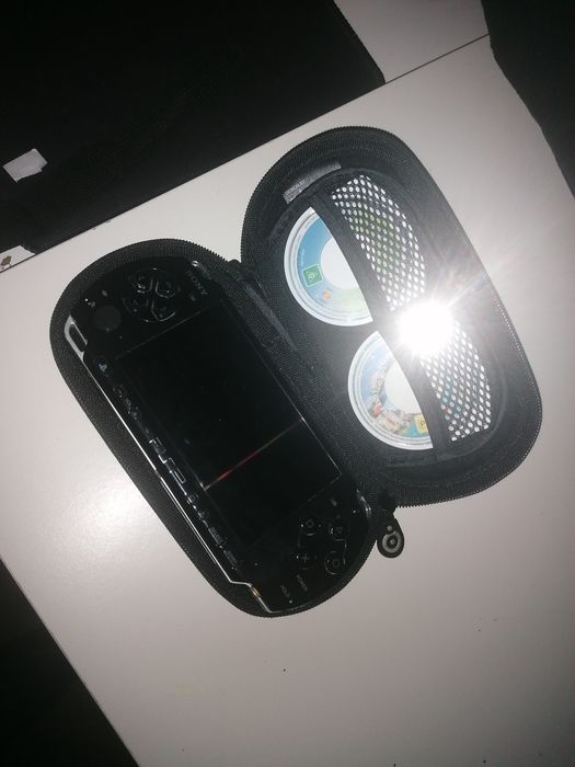 PSP desbloqueada com 2 jogos em cd