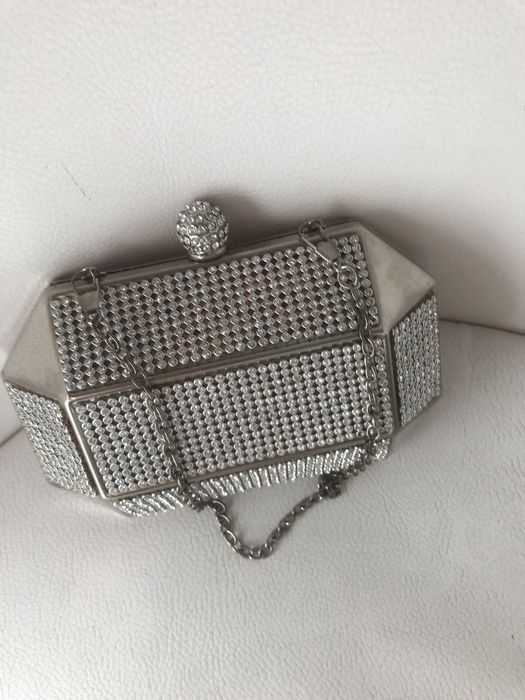 Srebrna torebka typu puzderko Simple.