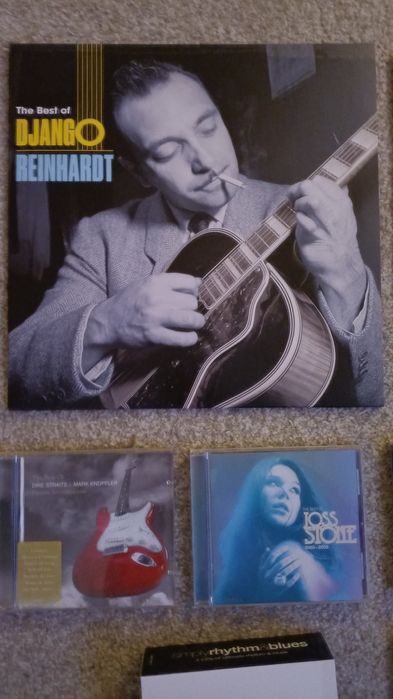 Discos de vinil e CD