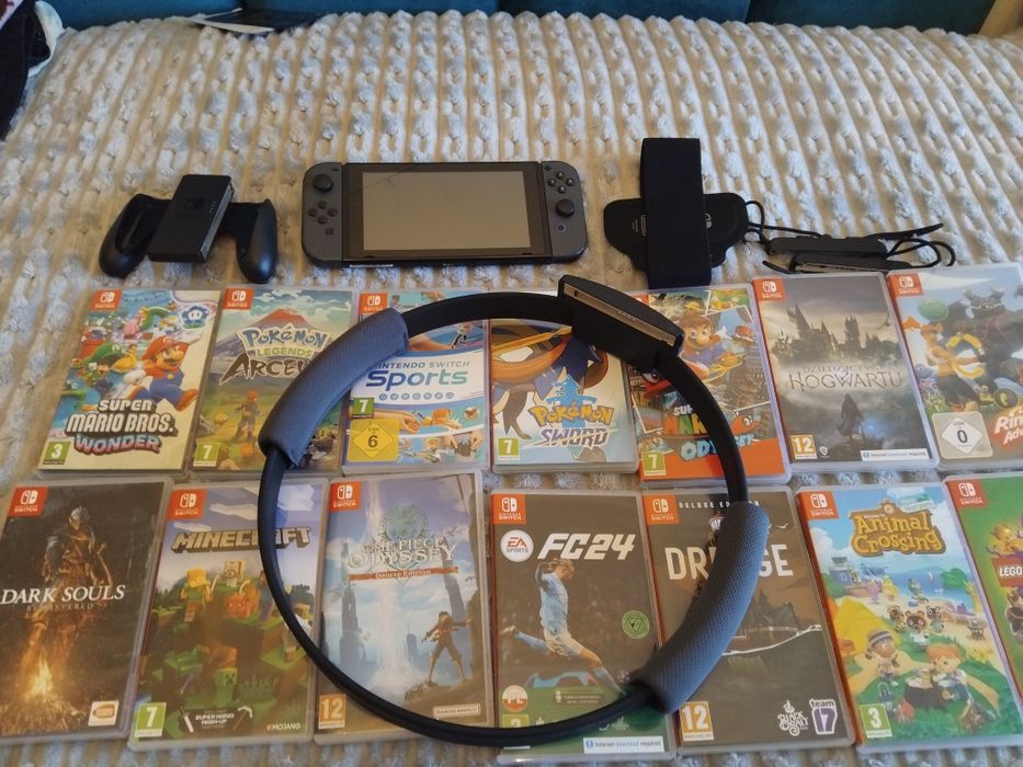 Nintendo swich w dobrym stanie z 14 grami +zestaw ring fit adventure +kilka gier na konsoli