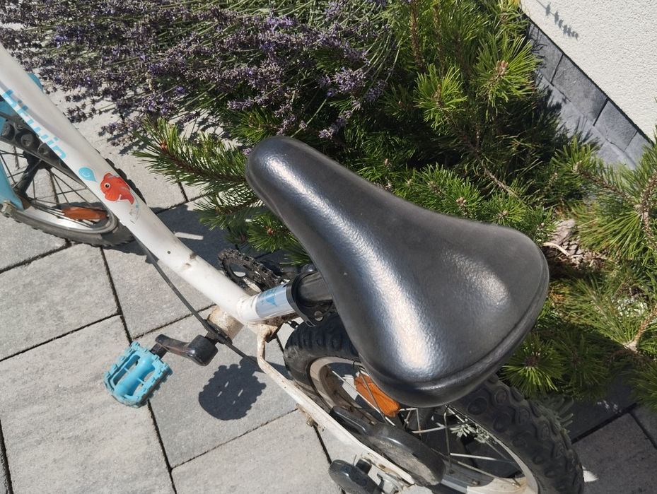 Rower btwin koła boczne