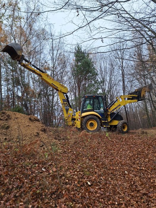 Usługi  koparko-ładowarką  100 zł za godzinę