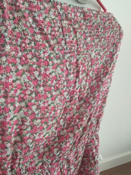 Macacão calção as flores praia ou campo.Super giro.