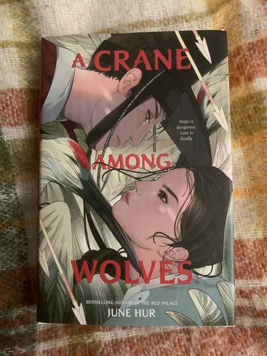 A crane among wolves by June Hur
