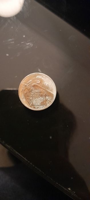 5 ptas espanhol .