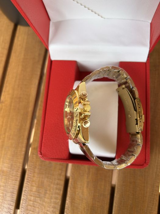 Relógio de homem dourado