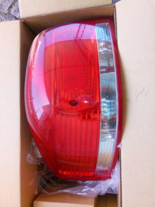 otica/FAROL ESQUERDA original audi A3 8P