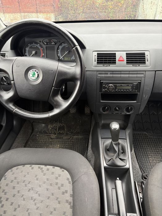 Skoda  fabia 1.2 бензин кондиціонер