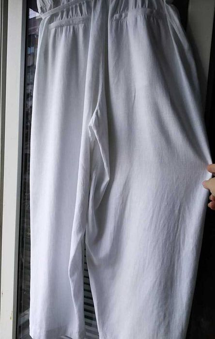 Белые льняные  брюки  фасон бананы  на бедра 120 см  лен льон лляні