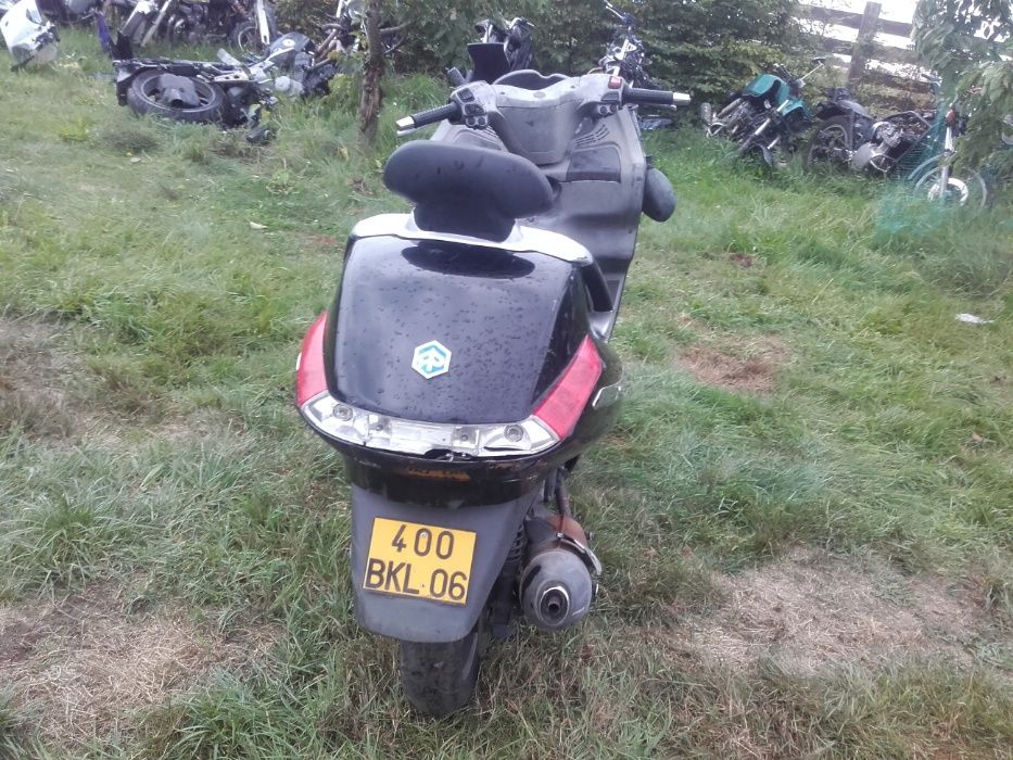 Piaggio x8 x 8 silnik lagi owiewka lampa koło felga tarcza części