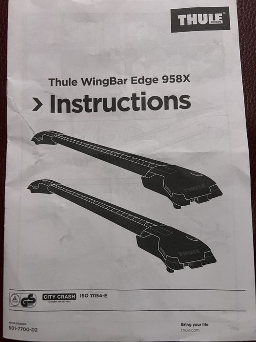 Thule WingBar Edge 958x na relingi Audi A4 B8
