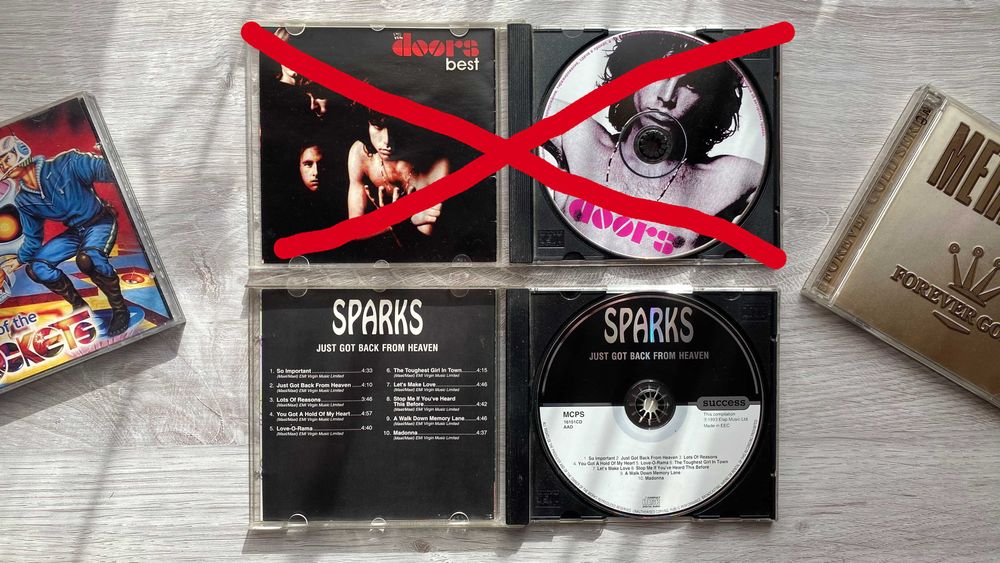 CD диски Metallica, Rockets, Sparks