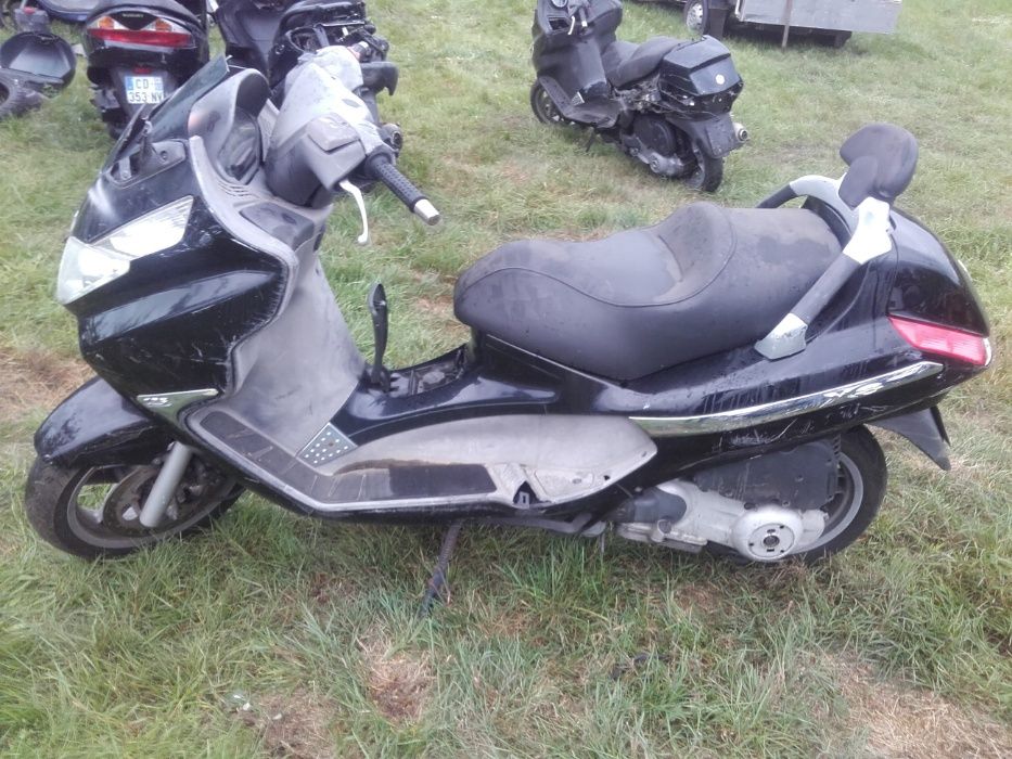 Piaggio x8 x 8 silnik lagi owiewka lampa koło felga tarcza części