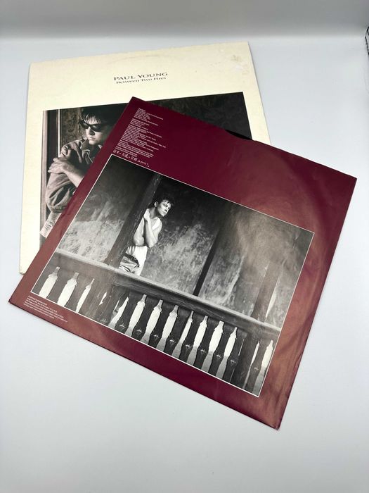 Paul Young - Between Two Fires (winyl) Banino • OLX.pl