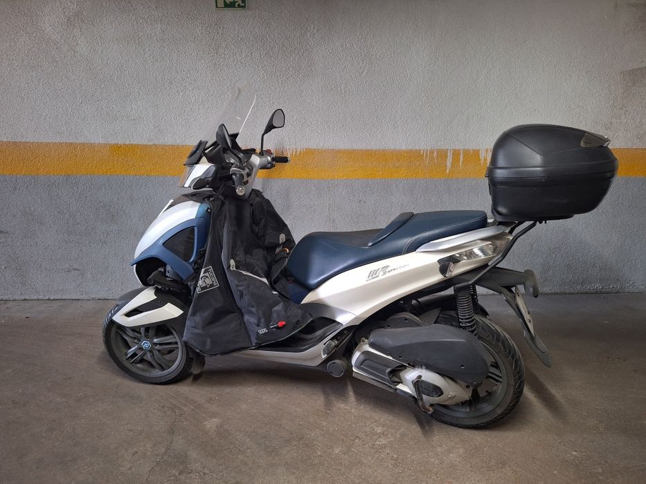 Mota triciclo piaggio mp3 yourban