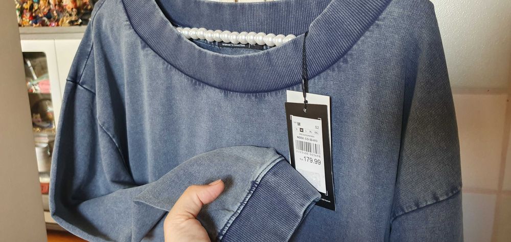 Modna sukienka dresowa Carry melanż w rozmiarze M. Nowa, z metką.