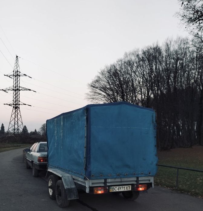 До вашої уваги бортовий 2-х осний причеп