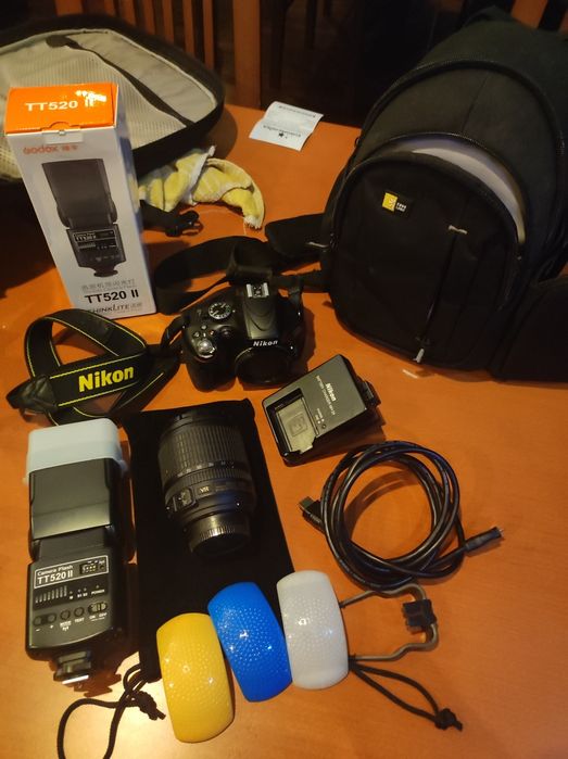 Nikon D5100 + lente 18-105 + mala + 2/ flash