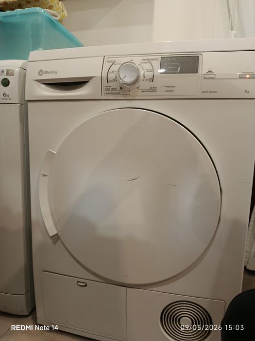 Máquina secar roupa