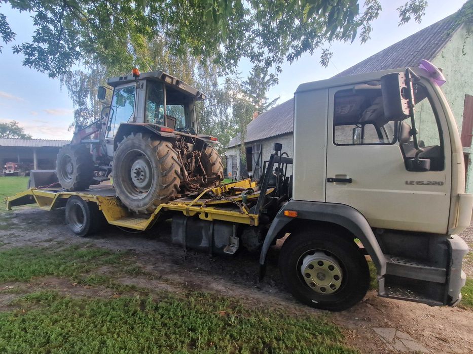 Przewóz maszyn transport traktora koparki laweta niskopodwozie