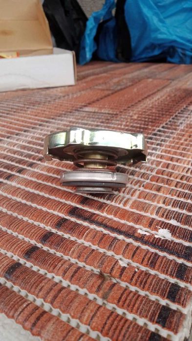 Крышка радиатора Додж гранд караван