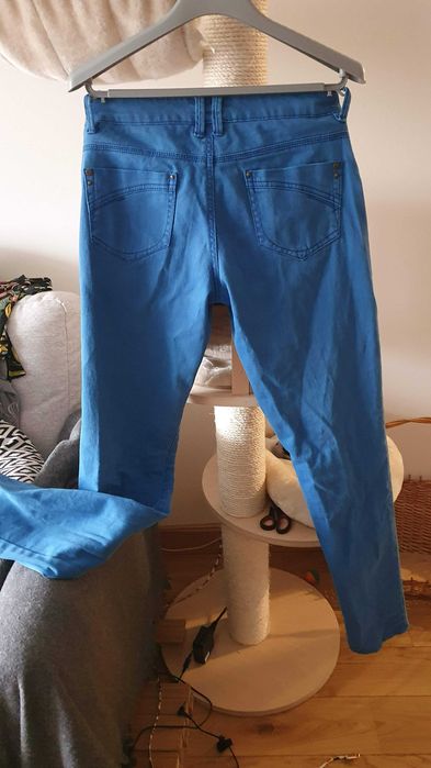 Niebieskie spodnie jeansy rurki slim fit Orsay 38