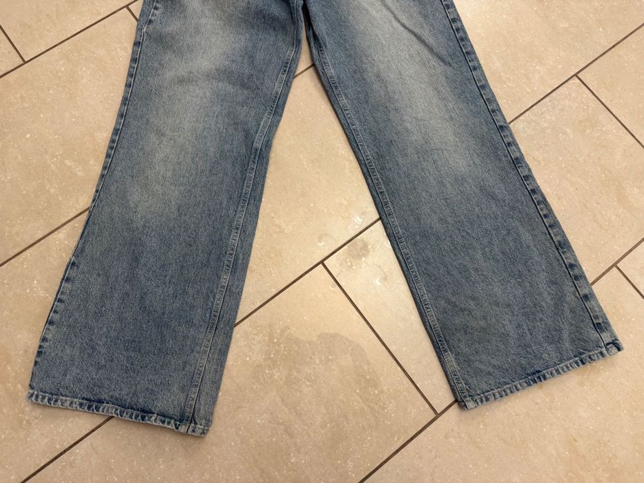 Stradivarius extra jeans spodnie dzwony szerokimi nogawkami L jak nowe
