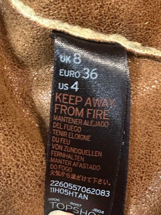 Beżowy damski płaszcz ze sztucznego futerka Topshop