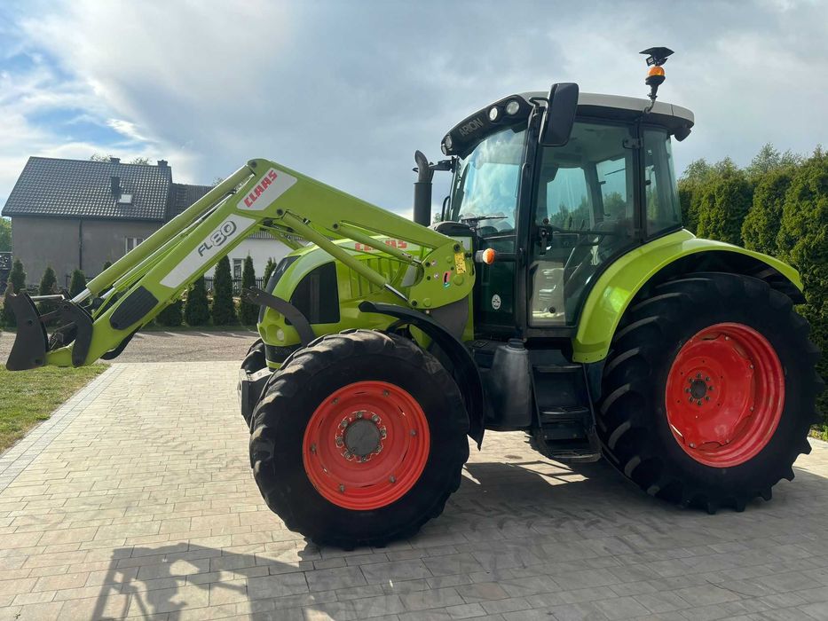 Claas Arion 510 z ładowaczem
