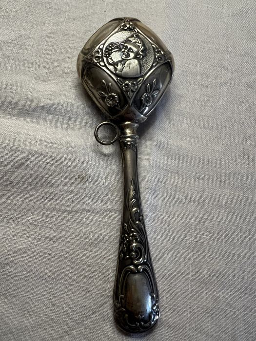 Roca de bebé em prata