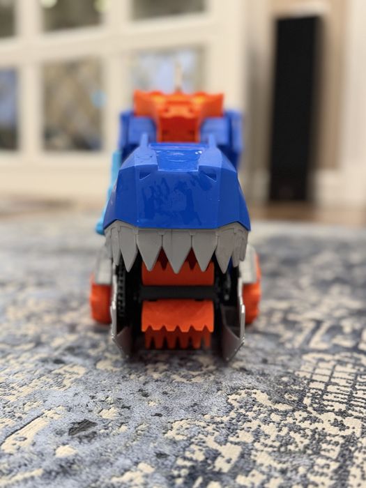 Мегатранспортер hot wheels ті рекс