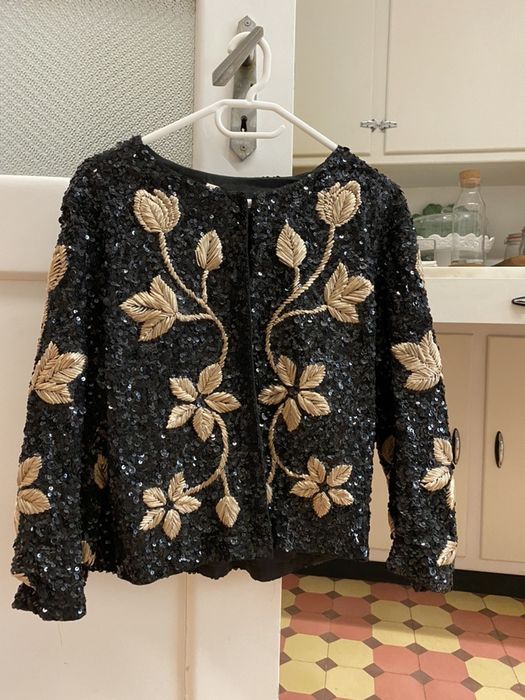 Casaco de lantejoulas 68€