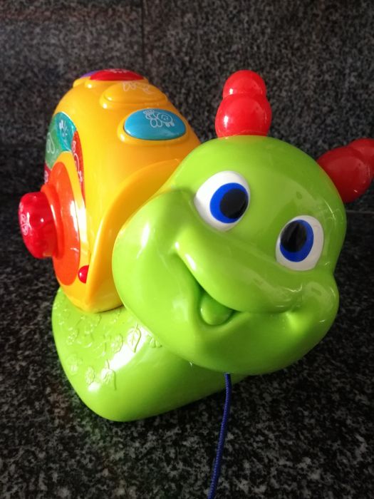 Brinquedo Chico (caracol musical com rodas)