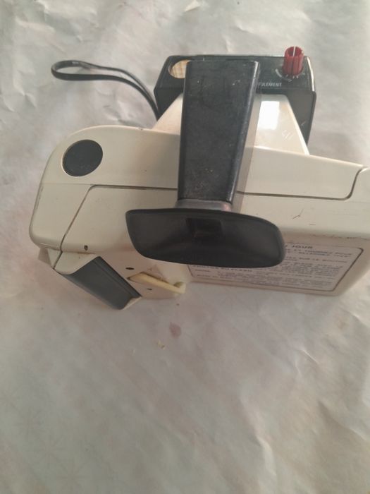Máquina fotográfica Polaroid Swinger (vintage)