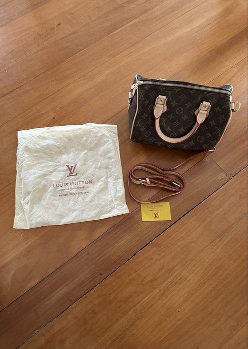 Mala Louis Vuitton Monograma Castanha