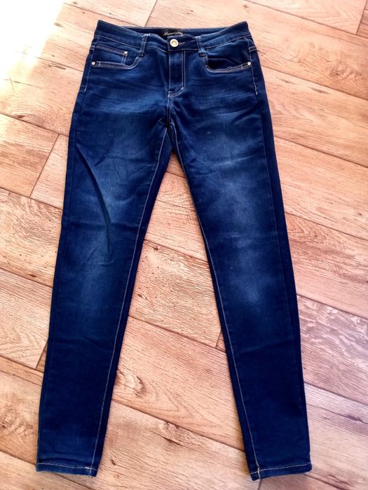 Spodnie dżinsowe granatowe rurki przecierane na biało