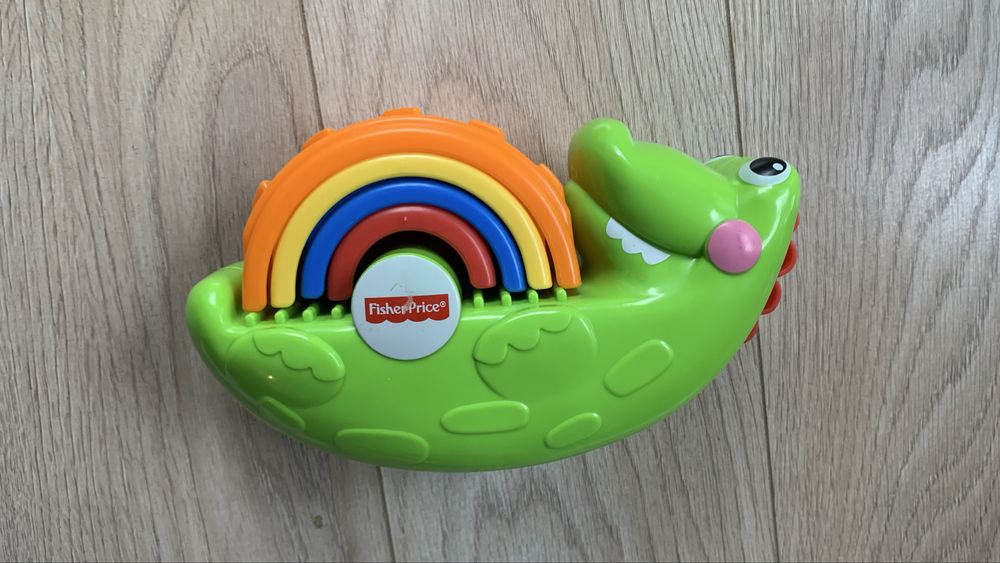 Zabawki dla niemowlaka - grzechotki, miekkie ksiażeczki, przytulanki