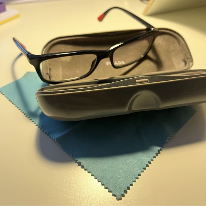 Óculos Prada VPS02C com lentes