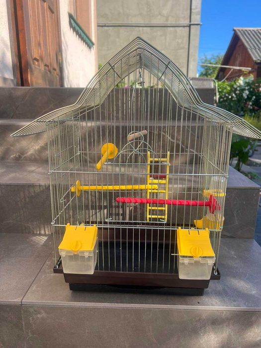 Клітка для папуги