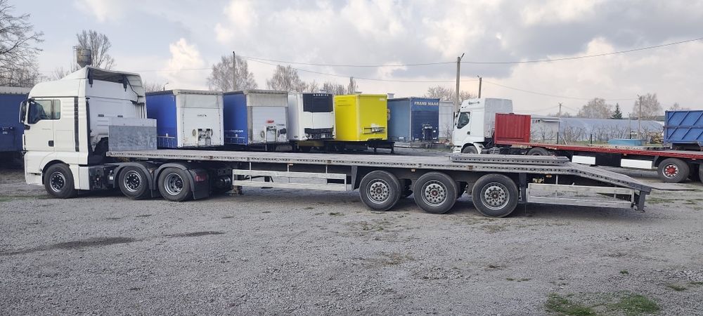 Трал полуприцеп платформа негабарит шміц